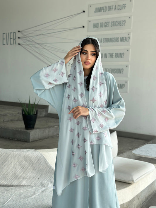 The Star Abaya is crafted with luxurious crepe fabric and stylish Sheila details. This abaya, designed with an elegant fit, provides superior comfort and a timeless look. Perfect for special occasions or everyday wear.